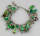 12 Charms mit 20 Perlen altsilber
