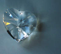 Regenbogenkristall Herz ca. 3-4 cm mit Chiffonbeutel